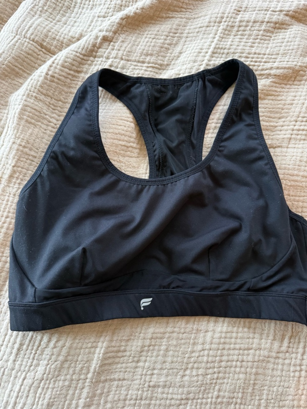 Fabletics Black Racerback Sports Bra with Subtle Logo Detail